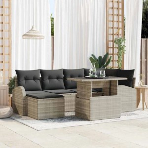 Hellgraues 7-teiliges Garten-Sofa-Set aus Poly Rattan mit Tisch und Auflagen.