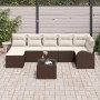 Braunes 8-teiliges Garten-Sofa-Set aus Rattan mit beigen Kissen und Tisch.