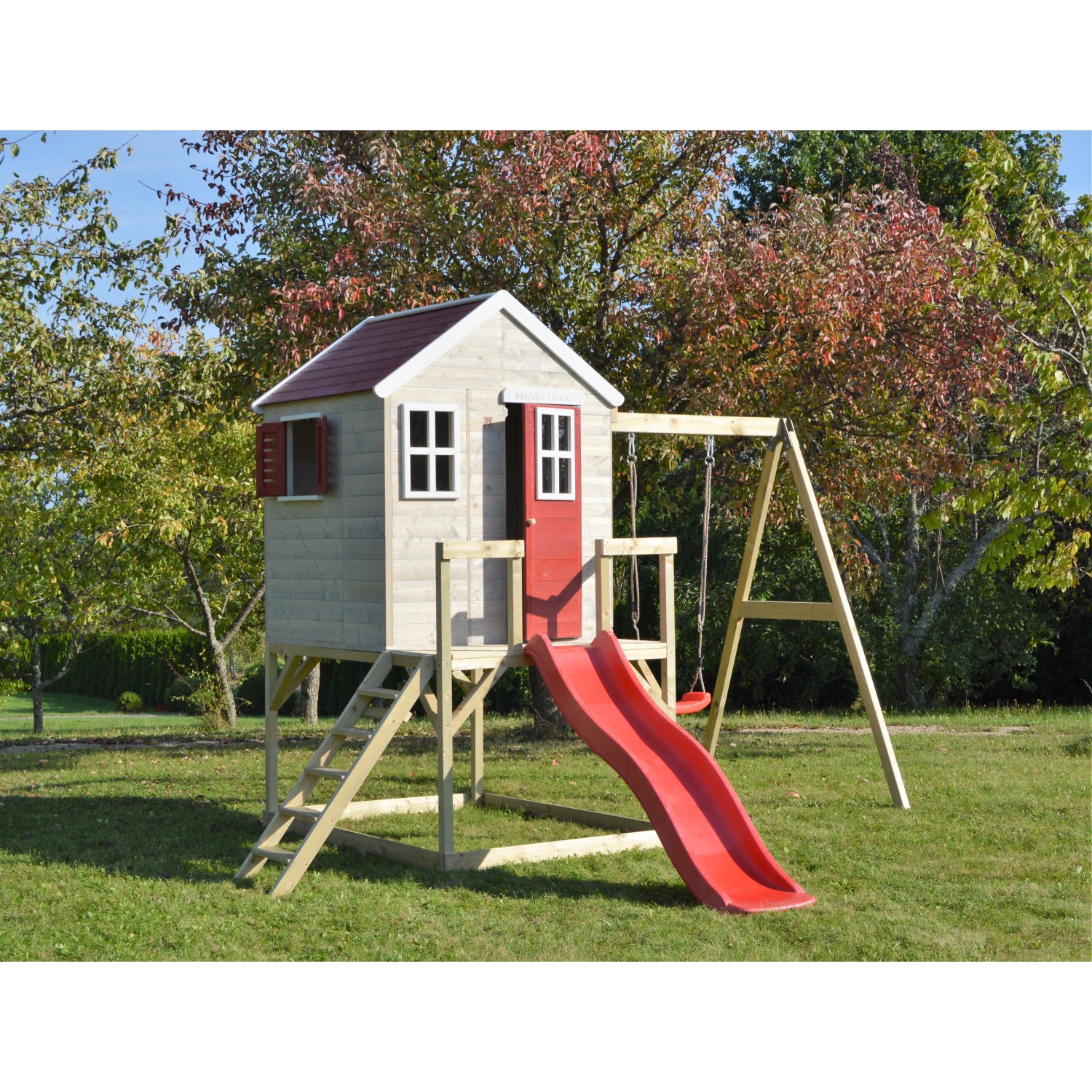 Wendi Toys Kinderspielhaus Elefant mit Veranda, Rutsche und Schaukel im Garten.