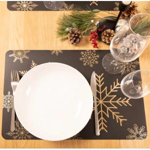 Rechteckiges, schwarz-goldenes Venilia Tischset Snowflakes (45x30cm) auf gedecktem Tisch.