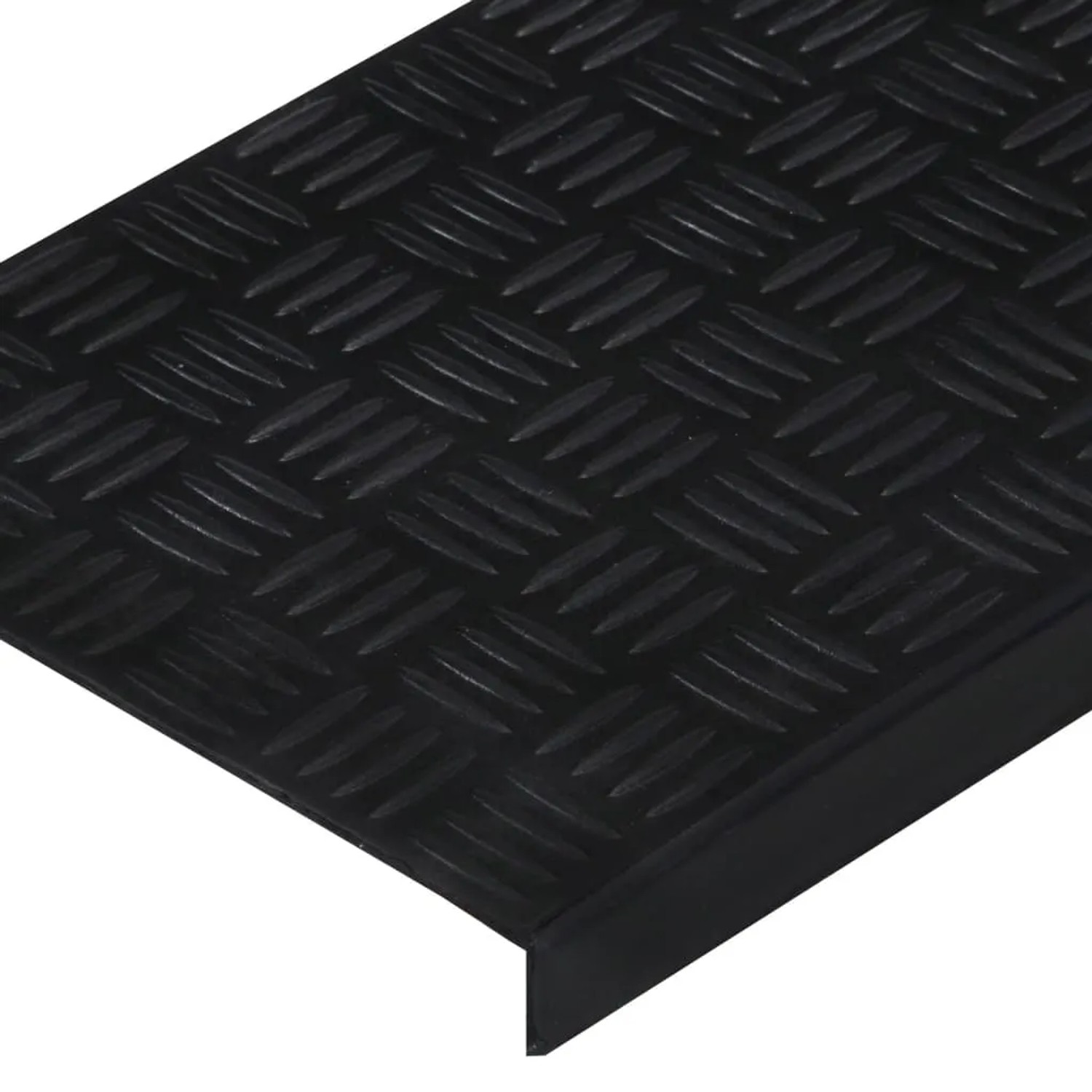 Schwarze Gummi Stufenmatte mit rutschfester Riffelblech-Struktur und Vorderkante für sicheren Halt auf Treppen.