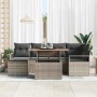 Graues 7-teiliges vidaXL Garten-Sofa-Set aus Rattan mit Stauraum und Tisch.