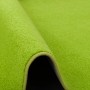 Grasgrüner Snapstyle Teppich Joy Velours, 133x133cm, Detailansicht der Teppichstruktur und Kettelung.