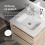 AM.PM Waschtischunterschrank Spike 60 cm in Eichenfarbe mit weißem Becken. Zeigt 2 Soft-Close-Schubladen und rutschfestes Innenmaterial.