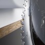 Bosch Kreissägeblatt Best for Laminate schneidet Laminatplatte, Detailaufnahme der Zähne.