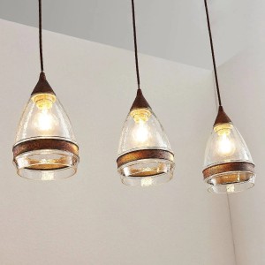 Lindby Millina 3-flammige Retro Pendelleuchte aus braunem Metall und strukturiertem Glas für die Küche.