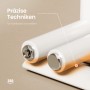Detailaufnahme: Weiße Röhren eines Emke Badheizkörpers, ovale Form, Fokus auf nahtlose Schweißtechnik.