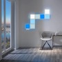 Wofi LED-Lichtkacheln 4er Basis-Set mit RGB Farbwechsel an Wand montiert.