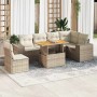 Beige 7-tlg. Garten-Sofagarnitur aus Rattan mit Tisch und Kissen für Terrasse oder Garten.
