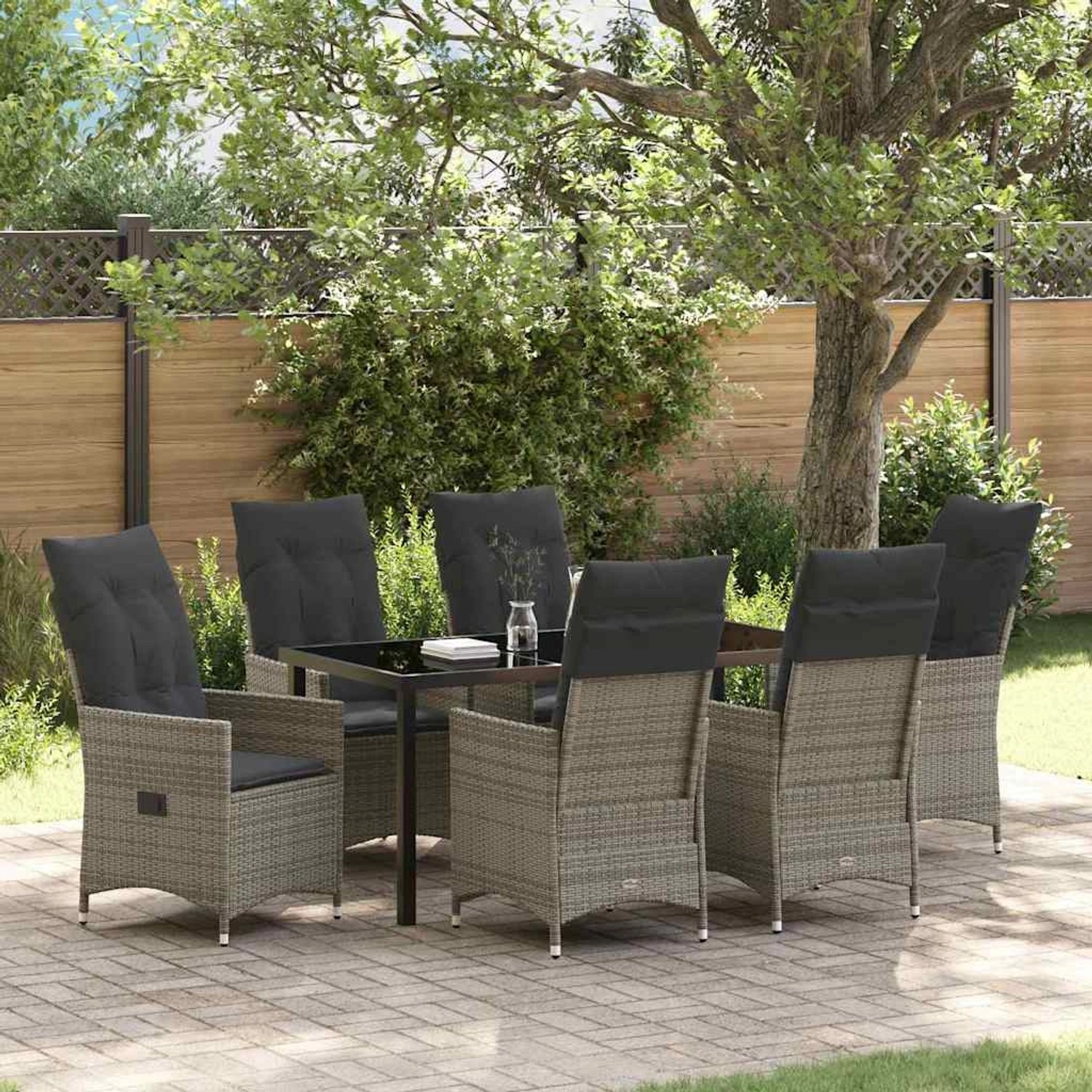 Graue 7-teilige vidaXL Garten Essgruppe aus Polyrattan mit Tisch und Stühlen mit Kissen.