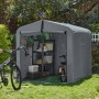 Graue SoBuy Fahrradgarage für 2-4 Fahrräder mit Regal und Zubehör.