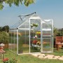 CANOPIA Gewächshaus 3,4 m² mit geöffneter Tür und Pflanzen auf Regalen im Garten.