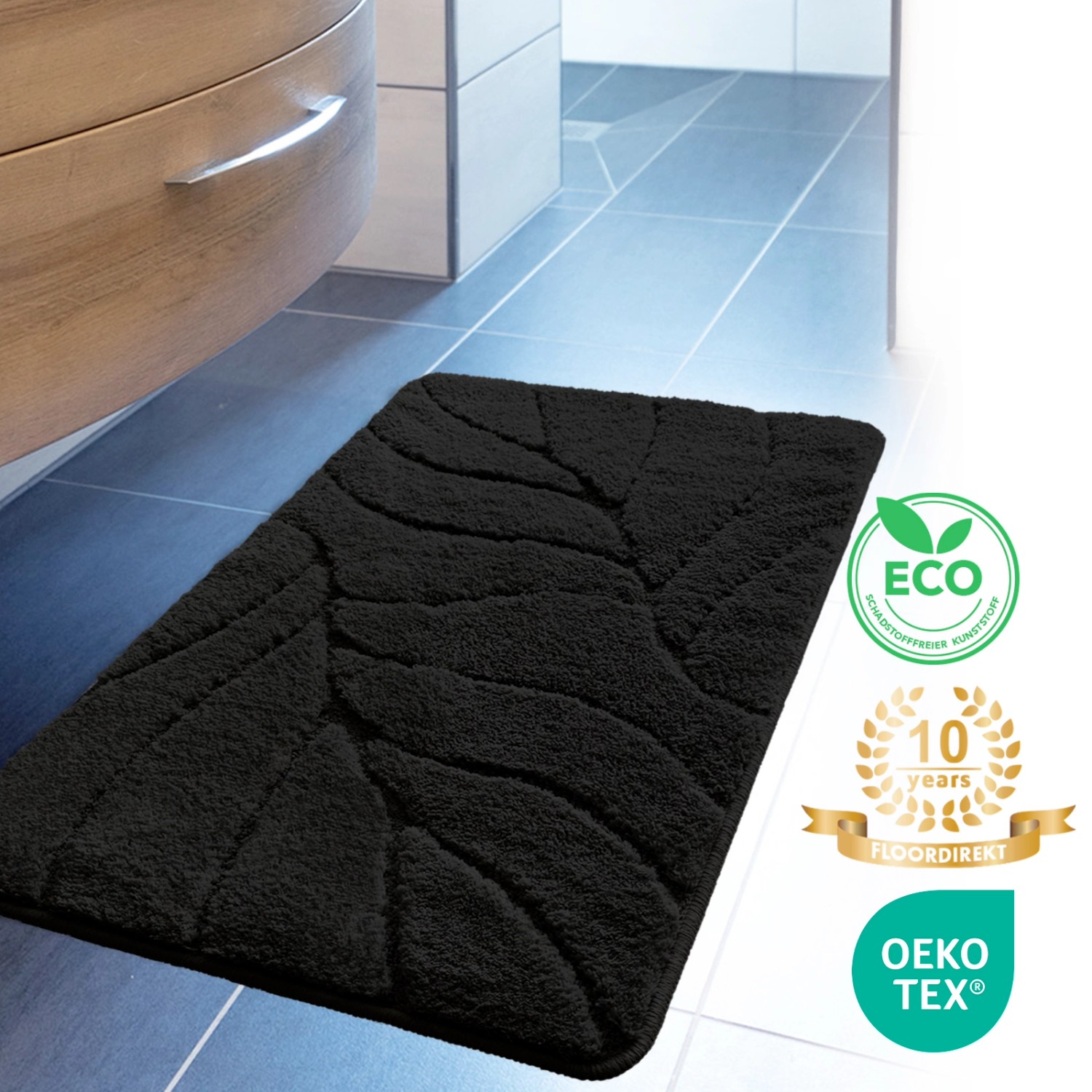 Schwarze Karat Badematte Maris mit Blattstruktur, 40x60 cm. Badvorleger/Badteppich für Badezimmer.