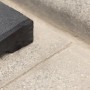 Schwarze Bordsteinrampe aus Gummigranulat, 1000x250x7-45mm, zum einfachen Überfahren von Bordsteinen.