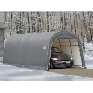 Graue ShelterLogic Zeltgarage 610x370x240 cm mit Auto im Winter.