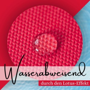 Nahaufnahme: Wassertropfen perlt auf pinkfarbener Sensalux Tischdecke ab. Wasserabweisend dank Lotuseffekt.
