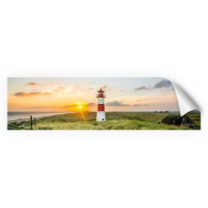 Myspotti Küchenrückwandfolie mit Leuchtturm Sylt Motiv bei Sonnenuntergang.