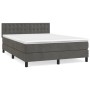 Dunkelgraues Boxspringbett 140x200 cm mit Matratze und Samtbezug.