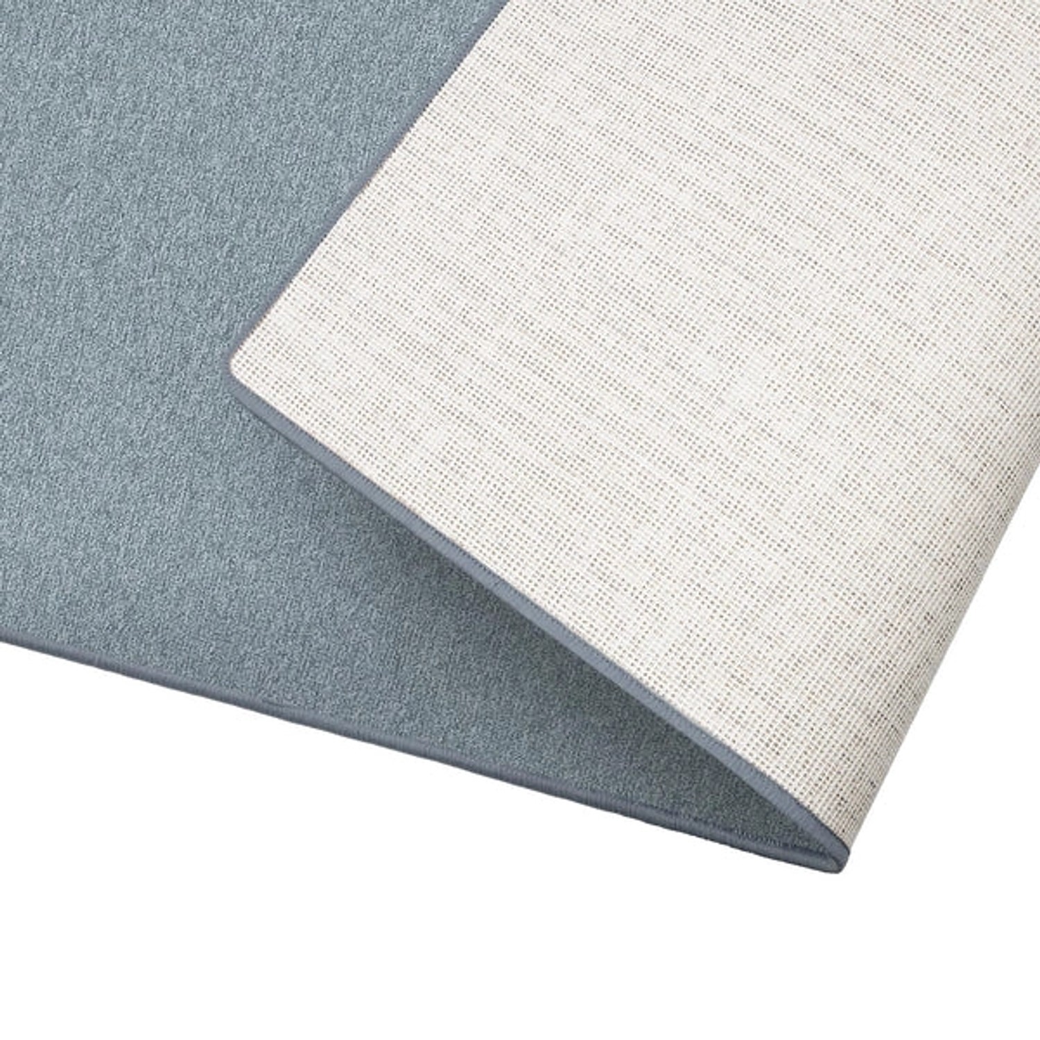 Detailansicht Karat Teppich London, hellgrauer Schlingenflor, 100x250 cm, mit Textilrücken.