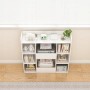 Weißes, offenes Regal „Rebiko“ mit Fächern für Bücher, Bürobedarf und Deko.