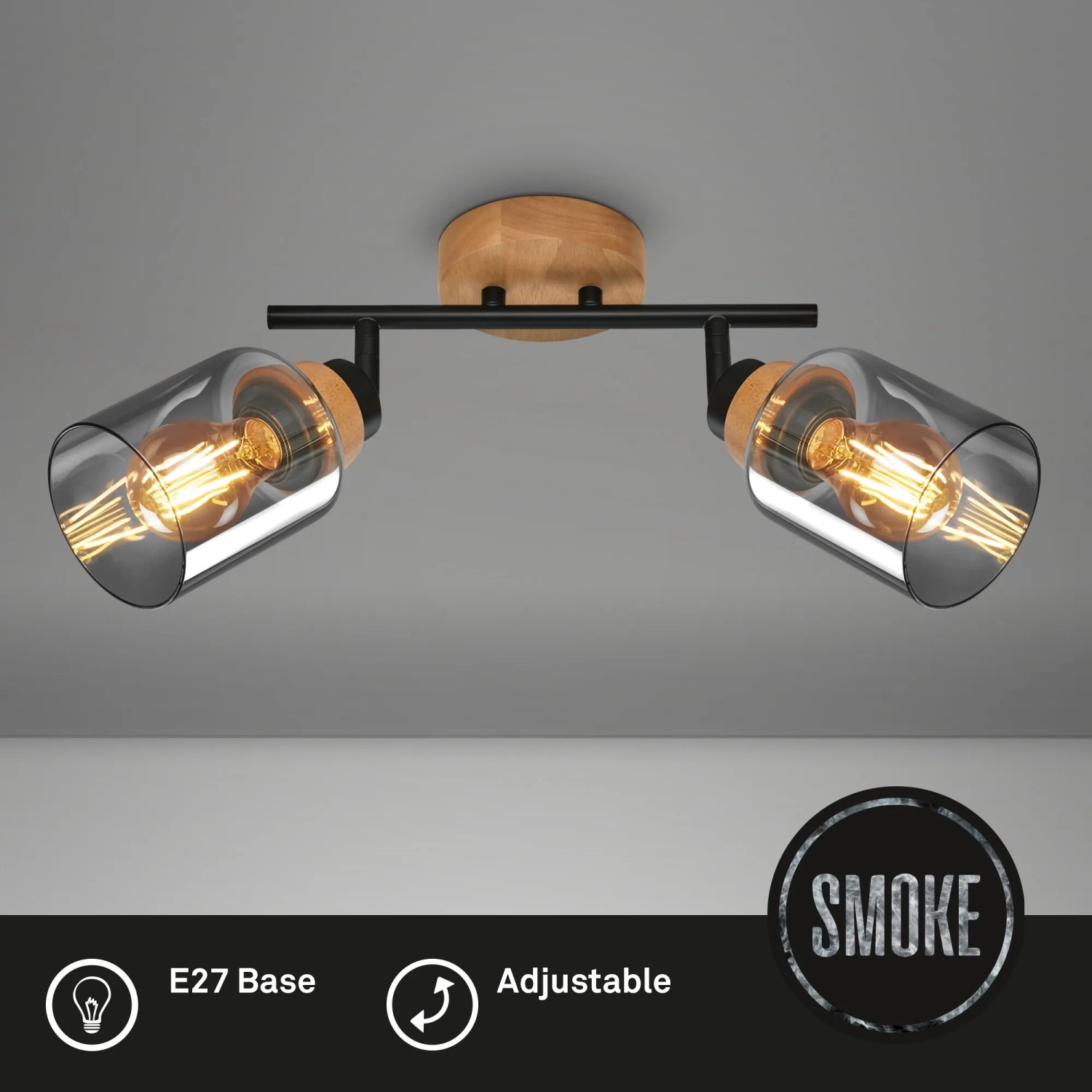 Brilo Deckenleuchte Hema mit zwei schwenkbaren Spots, Holzbasis und Rauchglas, E27 Fassung.