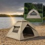 Beiges Relaxdays Campingzelt mit Schnellaufbau am Seeufer, auf Sand und Gras. Blackout-Automatikzelt für 3-4 Personen.