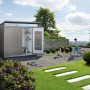 Biohort Metall-Gerätehaus AvantGarde ECO Gr. A1, quarzgrau-metallic, mit geöffneter Doppeltür im Garten.