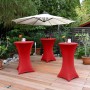 Rote Beautissu Stehtischhusse Stella für Stehtische Ø 70 cm im Garten.