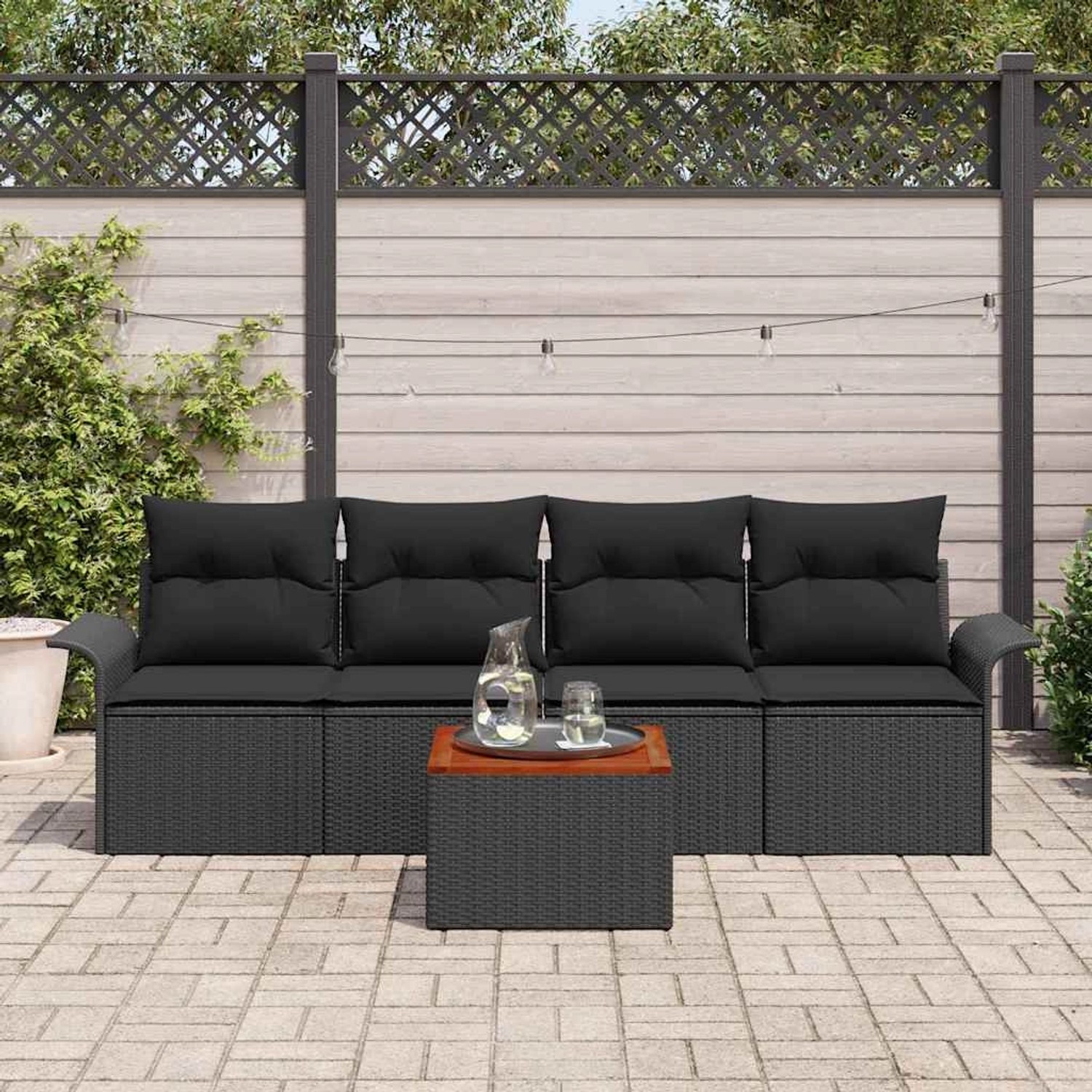 Schwarzes 5-tlg. vidaXL Garten-Sofa-Set aus Poly Rattan mit Tisch für Terrasse und Garten.