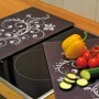 Westfalia Herdabdeckplatten Nero 2er-Set mit Ornament-Design auf Glaskeramikherd.
