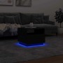Moderner schwarzer Couchtisch mit blauen LED-Leuchten. Stilvoller Wohnzimmertisch aus Holzwerkstoff, 50x49x40 cm.