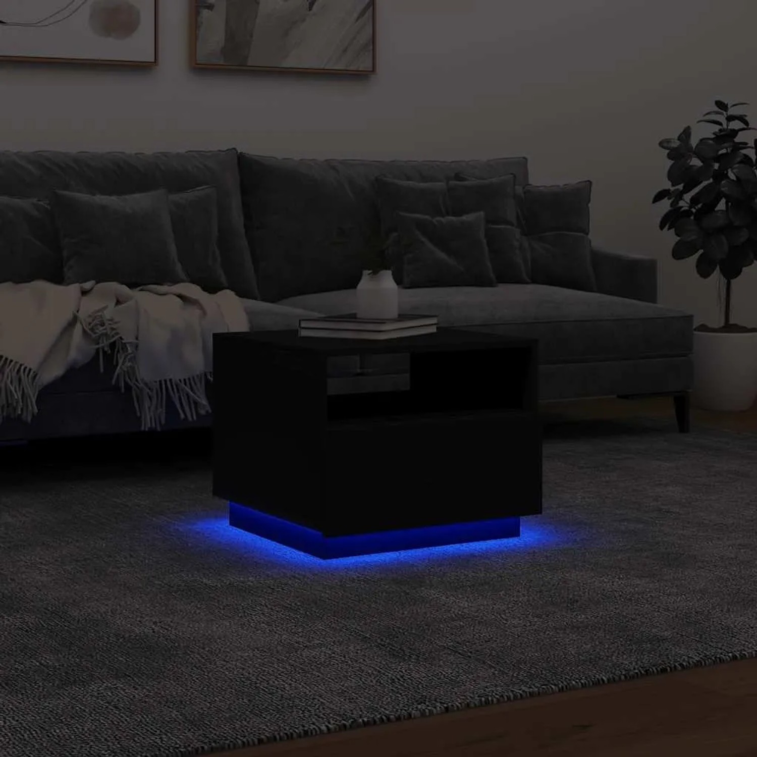 Moderner schwarzer Couchtisch mit blauen LED-Leuchten. Stilvoller Wohnzimmertisch aus Holzwerkstoff, 50x49x40 cm.