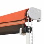 Eingerollte vidaXL Markise, orange-braun gestreift, mit weißer Halterung und Bedienkette.