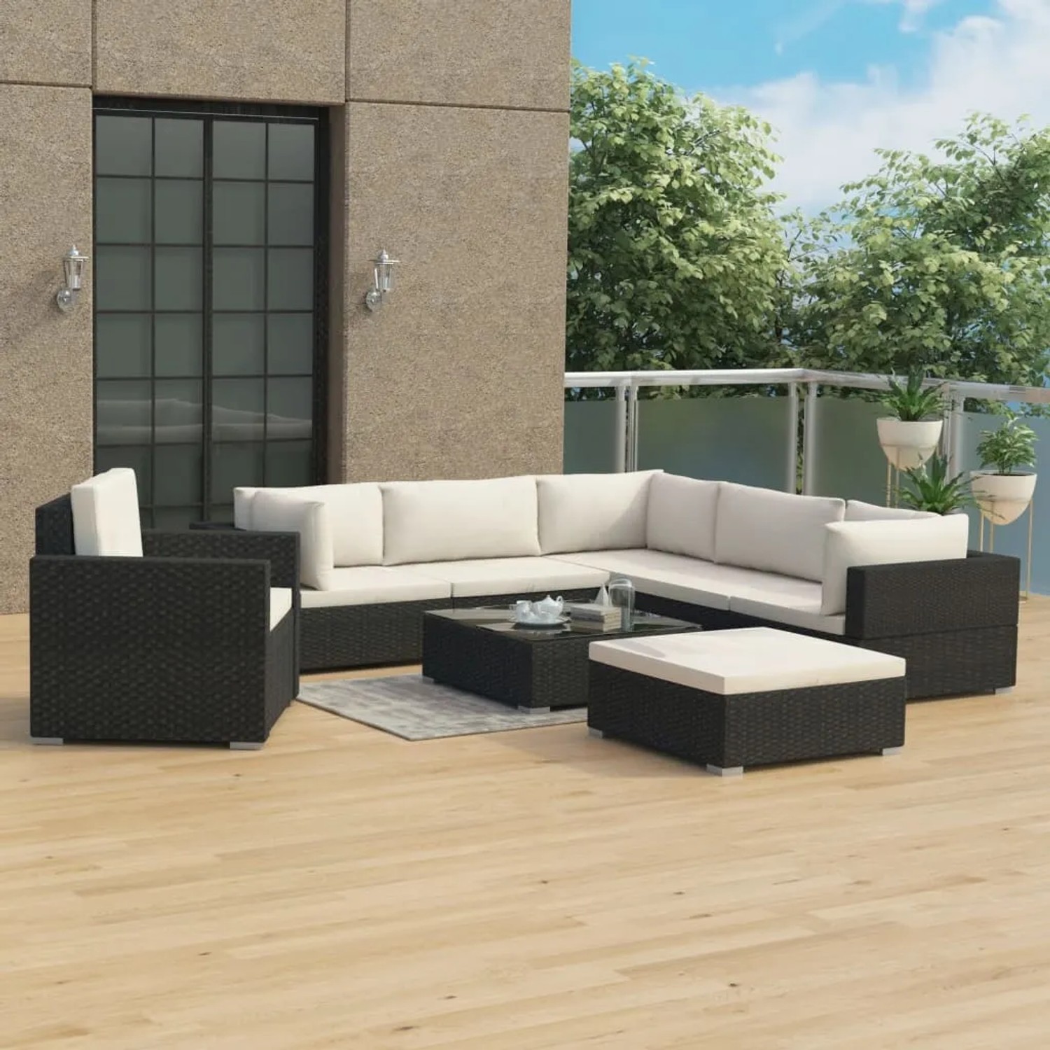 Schwarzes 8-tlg. vidaXL Garten-Lounge-Set aus Rattan mit cremefarbenen Auflagen.