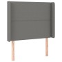 Dunkelgraues Boxspringbett 90x190 cm mit Stoffbezug und Kopfteil.