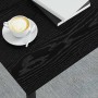 Schwarzer vidaXL Couchtisch in Eichen-Optik mit Kaffee und Büchern auf der Tischplatte.