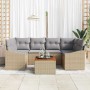 7-tlg. Garten-Sofa-Set aus Rattan und Akazie mit beigen Kissen.