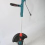 Texas Elektro-Trimmer Pro Trim 100 mit Teleskopgriff und Kantenschneidrädern.