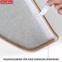 Detailaufnahme der beigen KARAT Stufenmatte London Pro (15er-Set) mit Klebestreifen zur einfachen Montage.