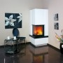 Hark Easy 500 Kaminofen mit Granit Verkleidung, 8 kW Leistung, in modernem Wohnraum.