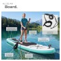 Frau paddelt auf aufblasbarem Tectake SUP Board Zenon auf See. Zeigt Paddel, Kamerahalterung, Fußschlaufe. Stabil & rutschfest.