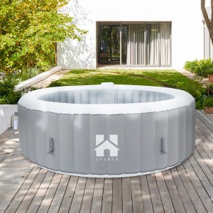 Grauer, runder Home Deluxe Whirlpool Splash (Ø 208 cm) im Garten.