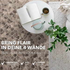 Karat CV Boden Atlantic Selby in Steinoptik, kombiniert mit Tisch, Teppich und Dekoration.