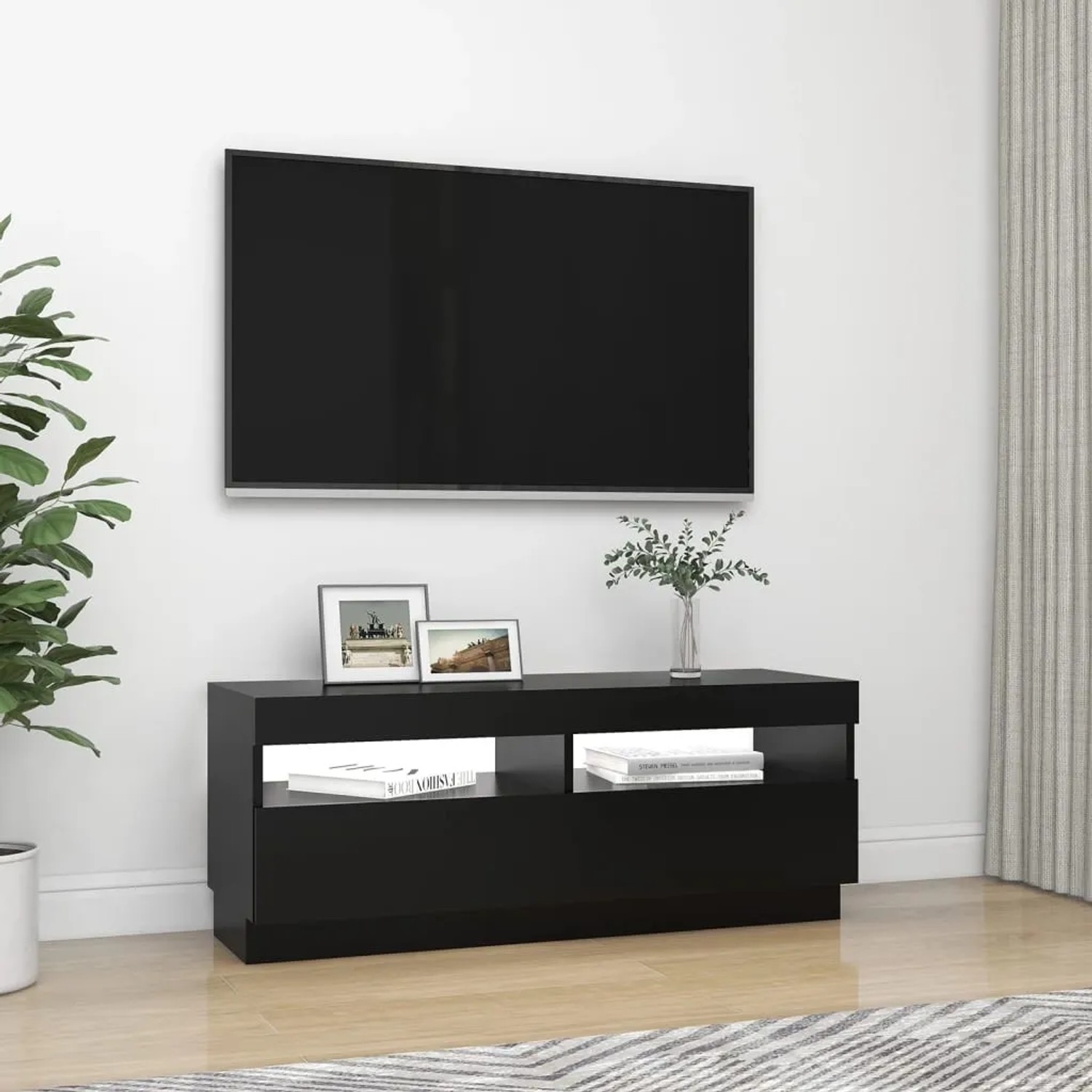 Schwarzer TV-Schrank mit LED-Beleuchtung, 100x35x40 cm, Teil der Wohnwand-Kategorie.