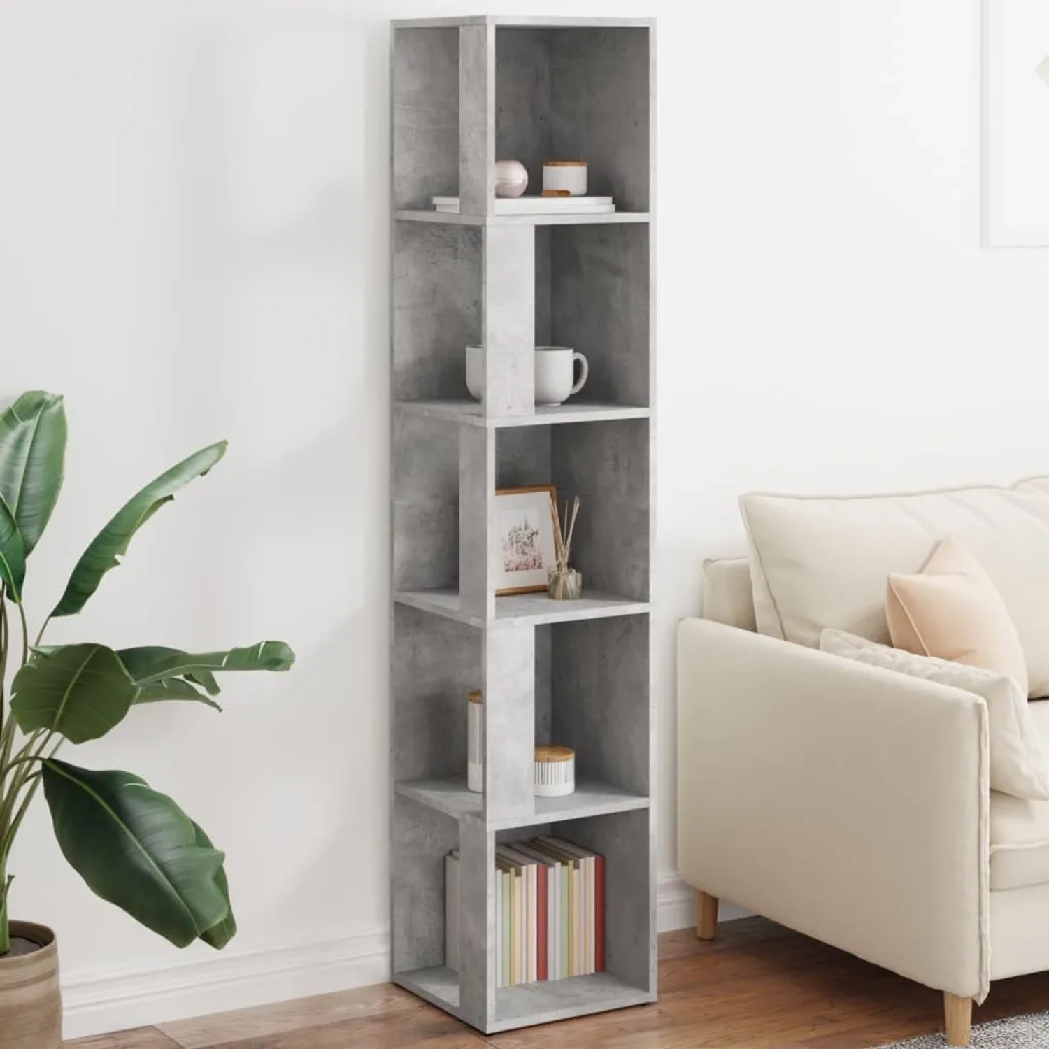 Eckregal in Betongrau mit fünf Fächern, ideal für Büro oder Wohnzimmer.