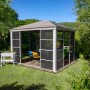 Sojag Pavillon Striano 10x12 Champagner mit Moskitonetz und Stahldach im Garten.