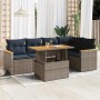 Graue 6-tlg. vidaXL Garten-Sofagarnitur aus Rattan mit marineblauen Kissen und höhenverstellbarem Tisch.