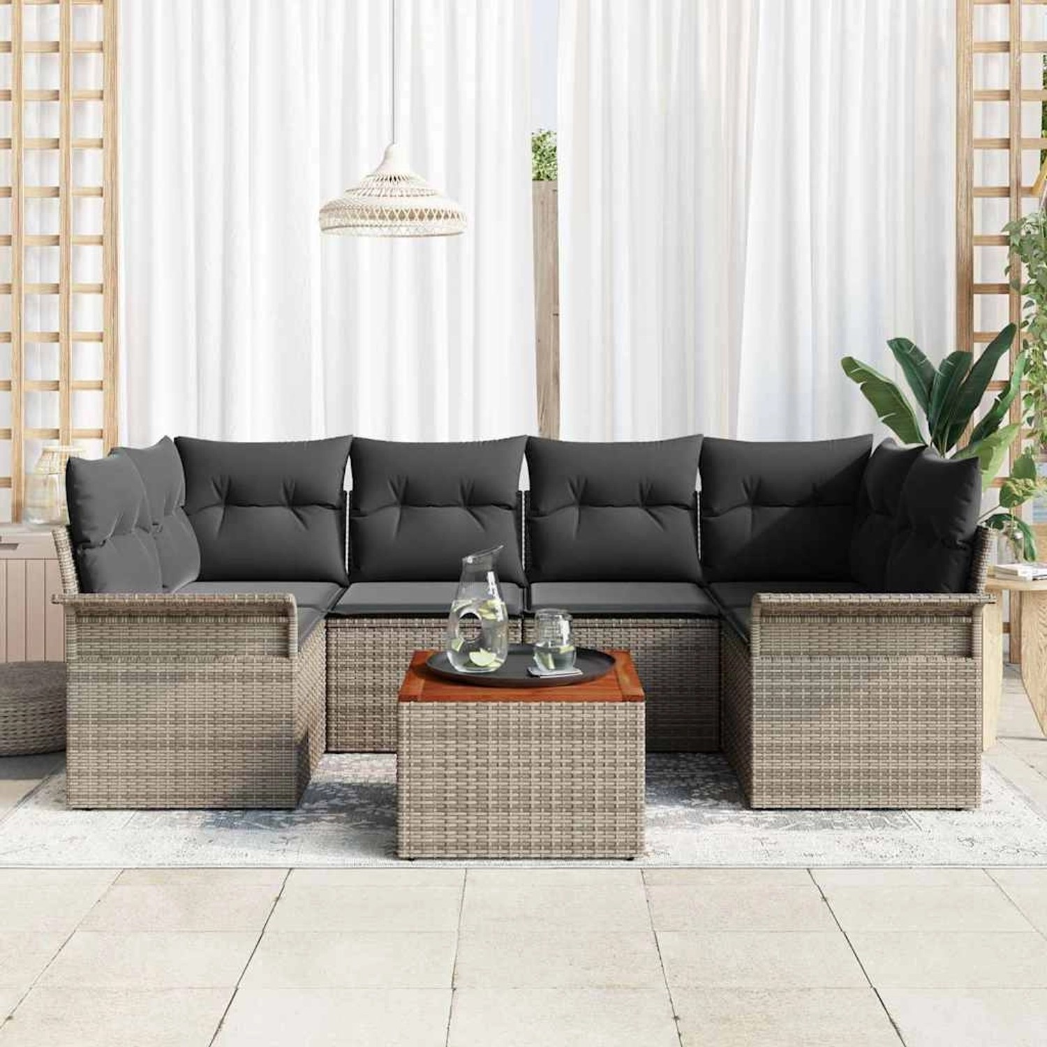 Graues 7-teiliges vidaXL Garten-Sofa-Set aus Poly Rattan mit Tisch und Stauraum.
