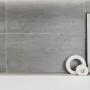 Graue Bodenfliese Harmony Feinsteinzeug, glasiert, 29,7x59,8 cm, Zement-Holzoptik.