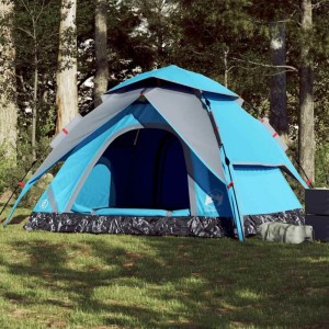 Blaues 5 Personen Kuppel-Campingzelt mit Quick-Release System im Wald.